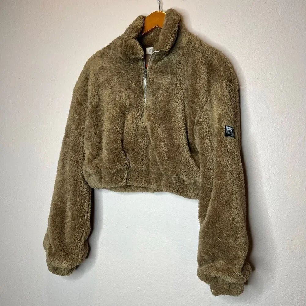 Oh Polly teddy bear chocolate jumper is a cropped, quarter-zip pullover in a coz